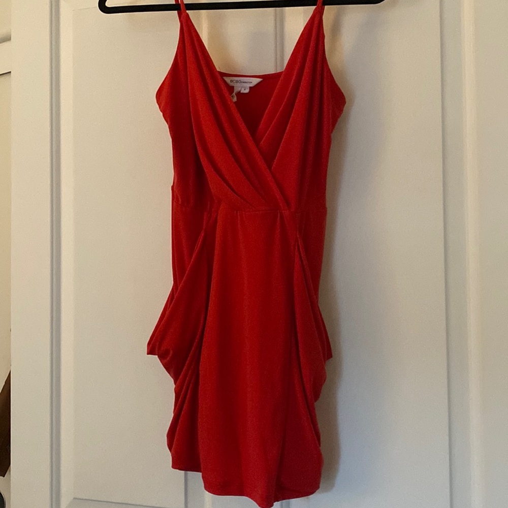 Coral / red BCBG minidress, size small, no wear and tear. V neck with pockets.